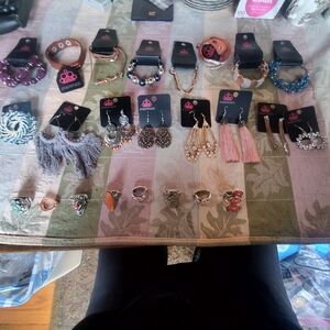 Costume Jewelry Lot 24. 8 Bracelets  8 Earrings. 8 Rings New  List 6